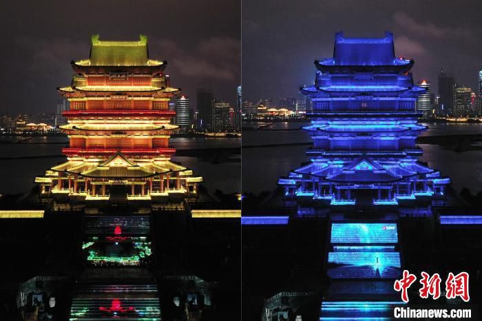 图为2021年4月2日，江南名楼滕王阁“点亮蓝灯”前后画面。（资料图）　　刘占昆 　摄