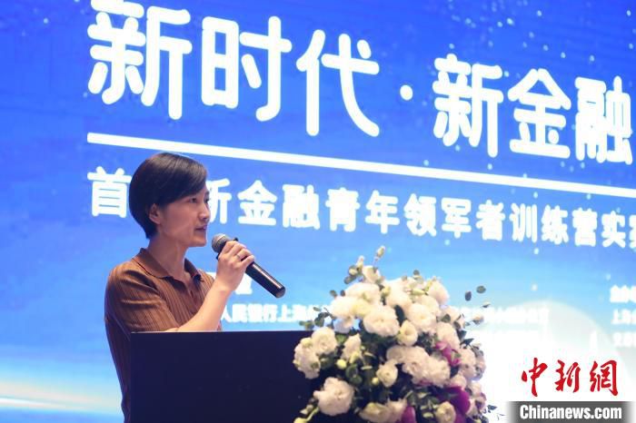 图为《基于农产品溯源的数字金融解决方案》团队成员发言。　 张亨伟 摄 摄